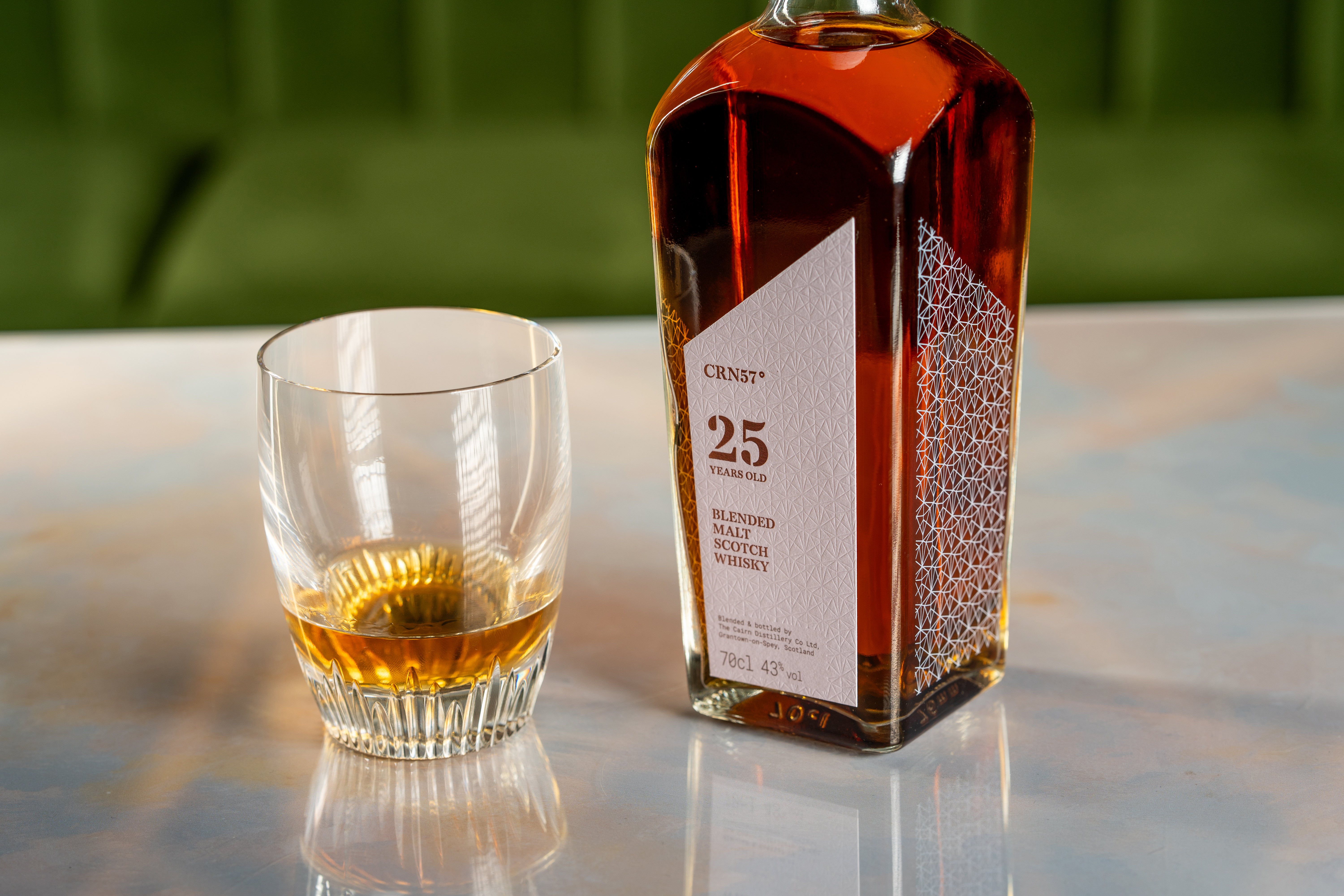 CRN57 25 year old blended malt Scotch whisky with one glass